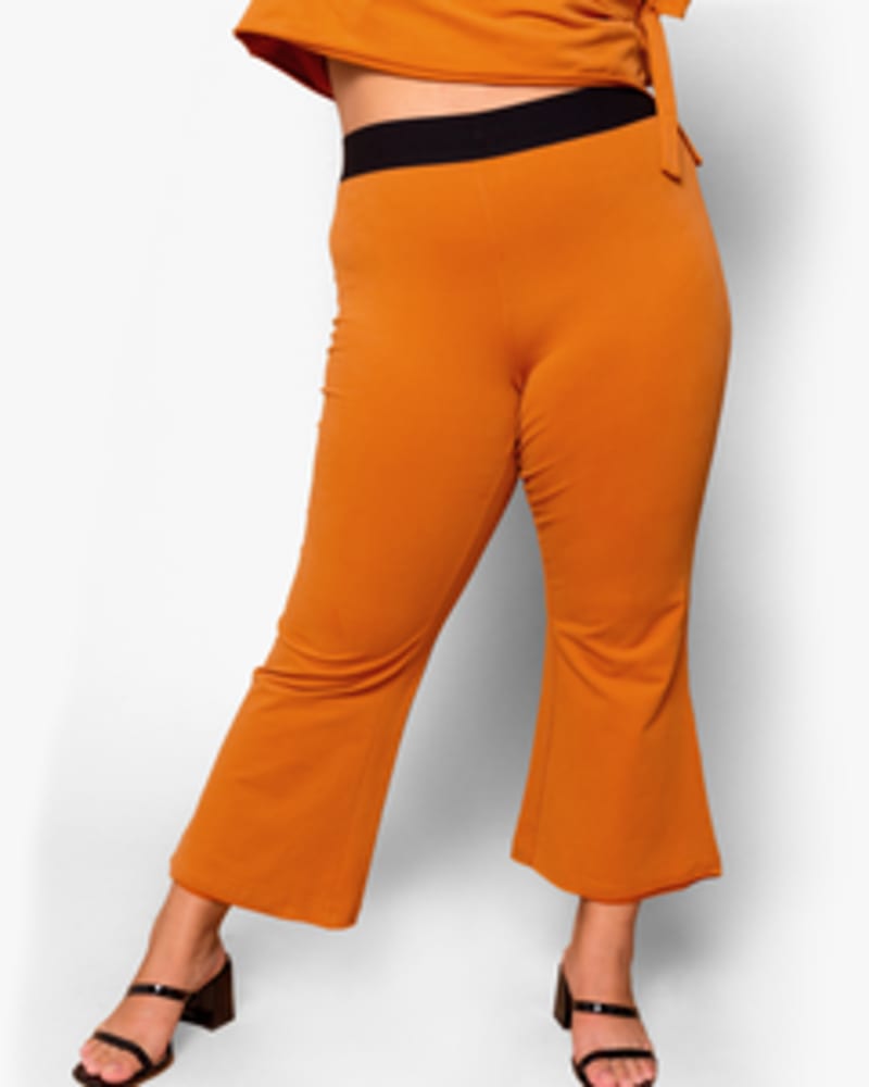 Front of a model wearing a size XL Eliza Flare Sweats in Pecan by Lovefool. | dia_product_style_image_id:249763